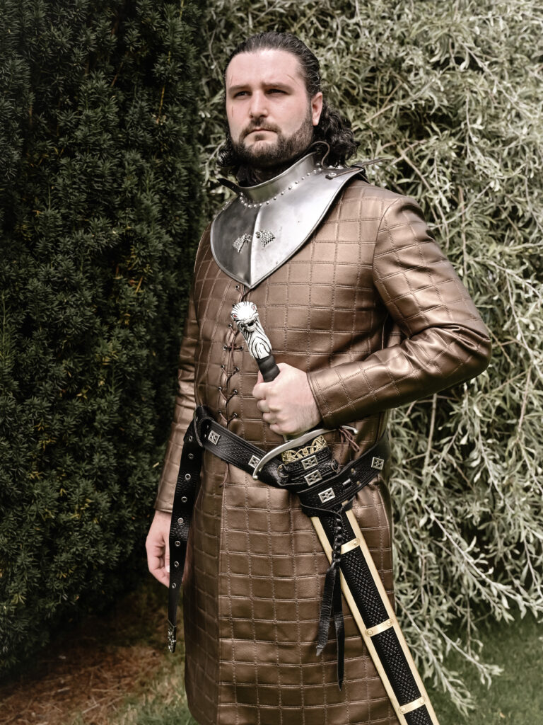 Upgrading Ryan’s Jon Snow costume has been a labor of love. So far, we’ve rebuilt the gambeson with quilted leather and replaced the iconic cloak using carefully sourced fabrics and a trusty IKEA rug for the fur trim. After hours of lacing, stitching, and tweaking, the results are worth it—a look fit for the Lord Commander himself!