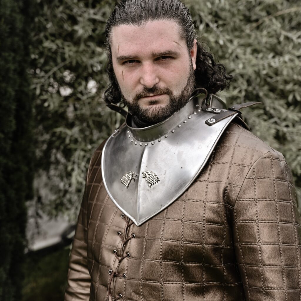 Upgrading Ryan’s Jon Snow costume has been a labor of love. So far, we’ve rebuilt the gambeson with quilted leather and replaced the iconic cloak using carefully sourced fabrics and a trusty IKEA rug for the fur trim. After hours of lacing, stitching, and tweaking, the results are worth it—a look fit for the Lord Commander himself!